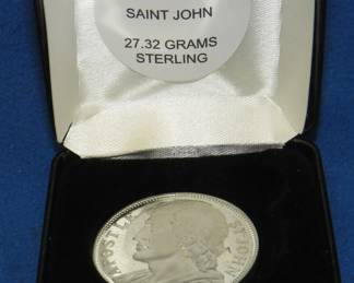 Lot 398. 1968 St. John sterling silver medallion. 27.32 grams.