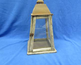 Lot 301. Primitive candle holder with 4 glass panels