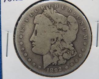 Lot 424. 1892 S Morgan silver dollar