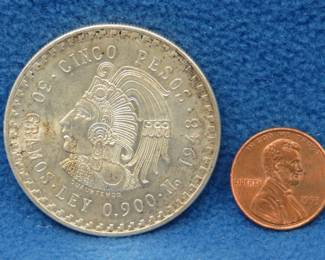 Lot 416. 1948 Mexican 5 peso 90% silver coin. 30.08 grams.