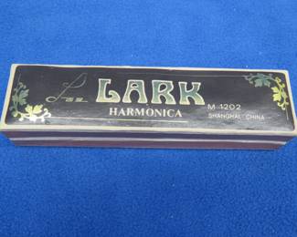 Lot 273. Lark 12-hole M1202 harmonica in like-new condition