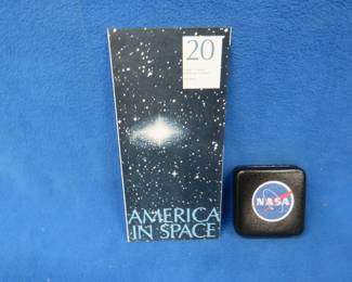 Lot 81. America in Space commemorative sterling silver medallion. 27.12 grams. Includes original brochure.