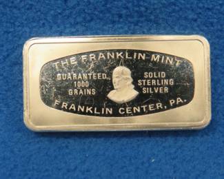 Lot 189. 1974 Franklin Mint sterling silver Christmas ingot. 65.56 grams.