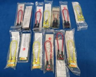 Lot 76. Thirteen new Ruger cable gun locks. Each with 2 keys.