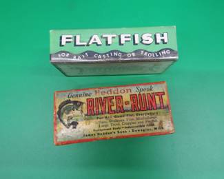 Lot 50. Like-new Heddon 2 1/2" Runt Spook Sinker in a box with papers. Helin Tackle 3 1/4" U20 Flatfish in a box marked U20 SIF.