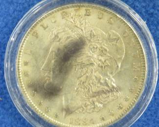 Lot 88. Toned 1884 P Morgan silver dollar