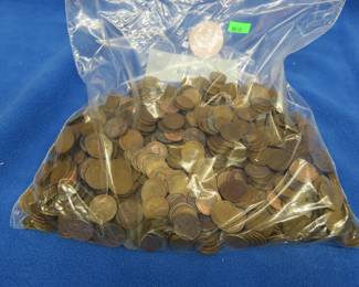 Lot 390. Approximately eight pounds (about 1,160) Lincoln Wheat pennies.