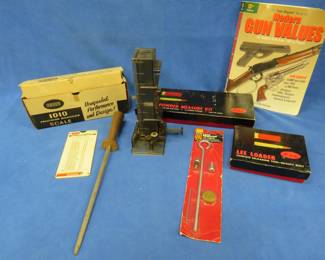 Lot 75. Reloading items: Lee Powder Measure Kit, Lee Loader for Pistol Cartridges, Ram-Line autoloader for Ruger 10-22, Ohaus scale (no pan), and more.
