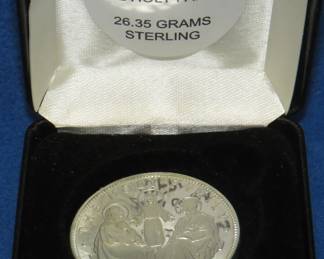 Lot 397. 1968 Holy Family sterling silver medallion. 26.35 grams.