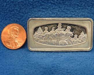 Lot 188. 1973 Franklin Mint sterling silver Christmas ingot. 66.08 grams.