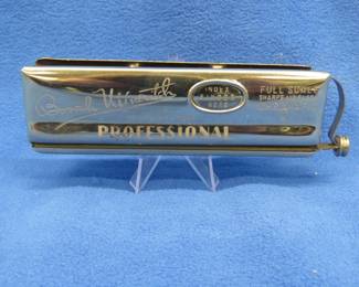 Lot 198. Borrah Minovitch and his Harmonica Rascals chromatic {#}1, 5" harmonica with great sound and a box in very good condition.