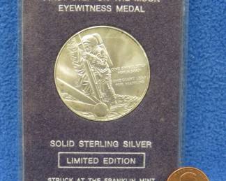 Lot 419. Franklin Mint sterling silver First Man on the Moon medallion