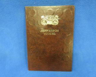 Lot 445. Dansco Jefferson Nickel album complete from 1938 through 1992 D including all 11 silver war nickels. Many seller-assigned high grades.