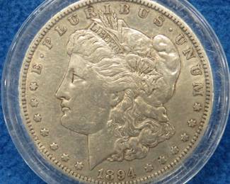 Lot 92. 1894 O Morgan silver dollar