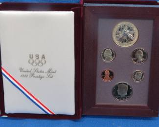 Lot 34. U.S. 1988 Liberty Prestige Set including a 90% Silver Dollar