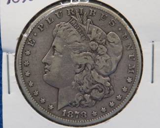 Lot 14. 1878 CC Morgan silver dollar 