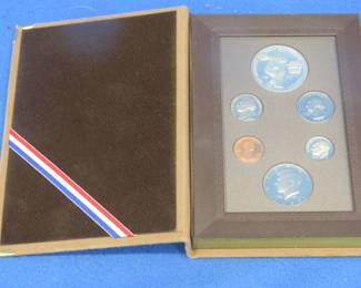Lot 31. U.S. 1983 Liberty Prestige Set including a 90% Silver Dollar