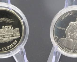 Lot 142. 1982 90% Silver Washington Commemorative Quarter and an Orient Express Silver Commemorative round with 1/2 troy oz. of .999 silver