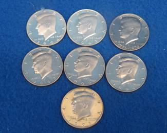 Lot 130. Seven post-1969 proof Kennedy Halves