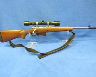 Lot 28. Ruger Gunsite Scout. Bolt-action 308 Win Mag. Ser. No. 680-57970. Includes stainless steel barrel, wood stock, Pine Ridge scope, case, 3 magazines.