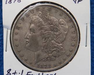 Lot 420. 1878 P Morgan silver dollar. 8 tail feathers.