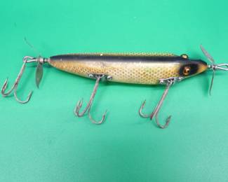 Lot 215. Vintage Heddon 4 1/8" wooden SOS with glass eyes in excellent condition