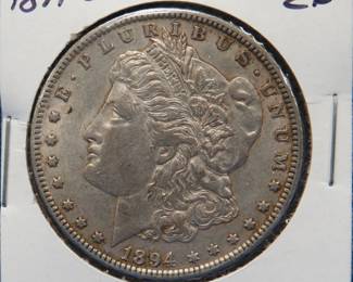 Lot 425. 1894 O Morgan silver dollar