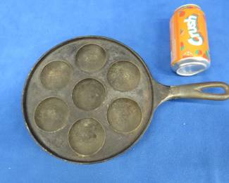Lot 320. Cast iron No. 33 munk (ebelskiver) pan
