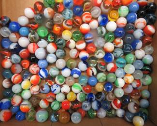 Lot 101. Two different sizes of marbles