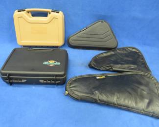 Lot 77. Three hard-sided and two soft-sided handgun cases