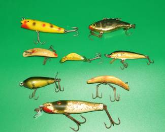Lot 212. Bag O' Baits: CCBC Darter, Buck's Bait 1 1/2" spoon plug, CCBC wooden Pikie with glass eyes, and more