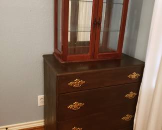 CHEST OF DRAWERS AND LIGHTED CURIO CABINET