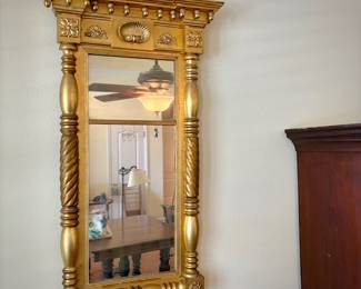 Antique gilt split spindle mirror with seashell detail