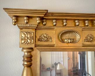 Antique gilt split spindle mirror with seashell detail