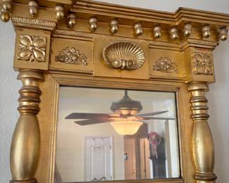 Antique gilt split spindle mirror with seashell detail