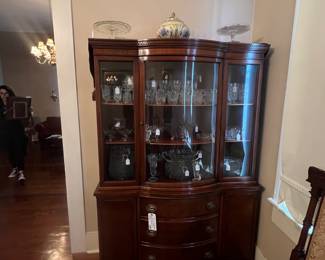 China Cabinet with American Fostoria  and  Whitehall  crystal.  Cake plate s on top and  antique RK Dresden Germany casserole   