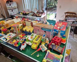 Lots of vintage Fisher Price toys