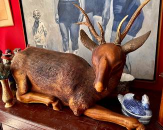 Solid wood carved deer with real antlers