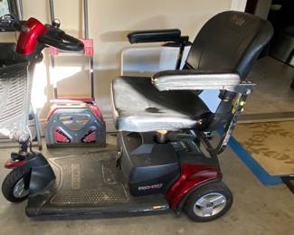 Pride GOGO mobility scooter with charger. Runs, clean, good condition.