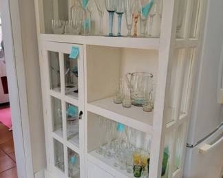 Display cabinet with glass door and drawers