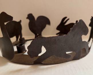 Vintage cut metal animal motif candle holder