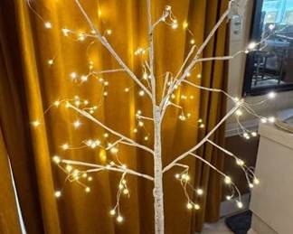 Lighted birch tree