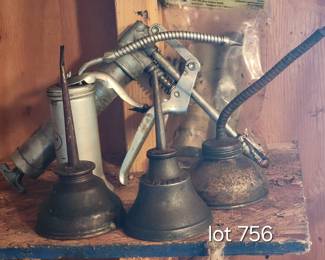 Vintage oil cans grease gun