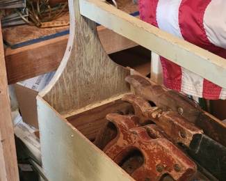 Hand saws in long wood tool caddy