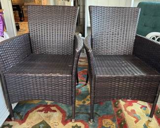 Pair of outdoor woven resin chairs