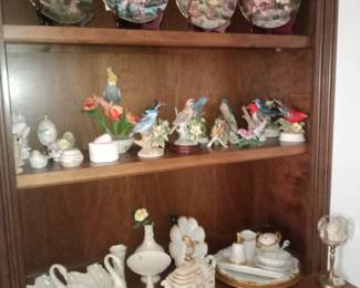 Hummel collectible plates, Lenox on bottom shelf