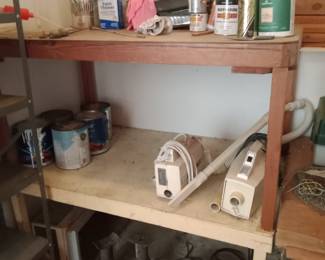 Some paint supplies, battery charger, jack stands