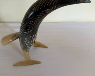Bird sculpted from horn