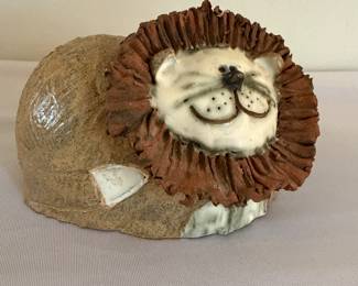 Pottery lion by "Meadows"