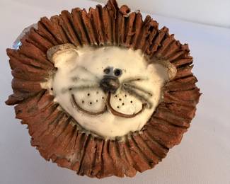 Pottery lion by "Meadows"